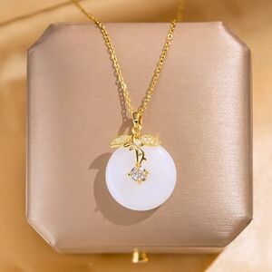 Elegant Gold and White Pendant Necklace